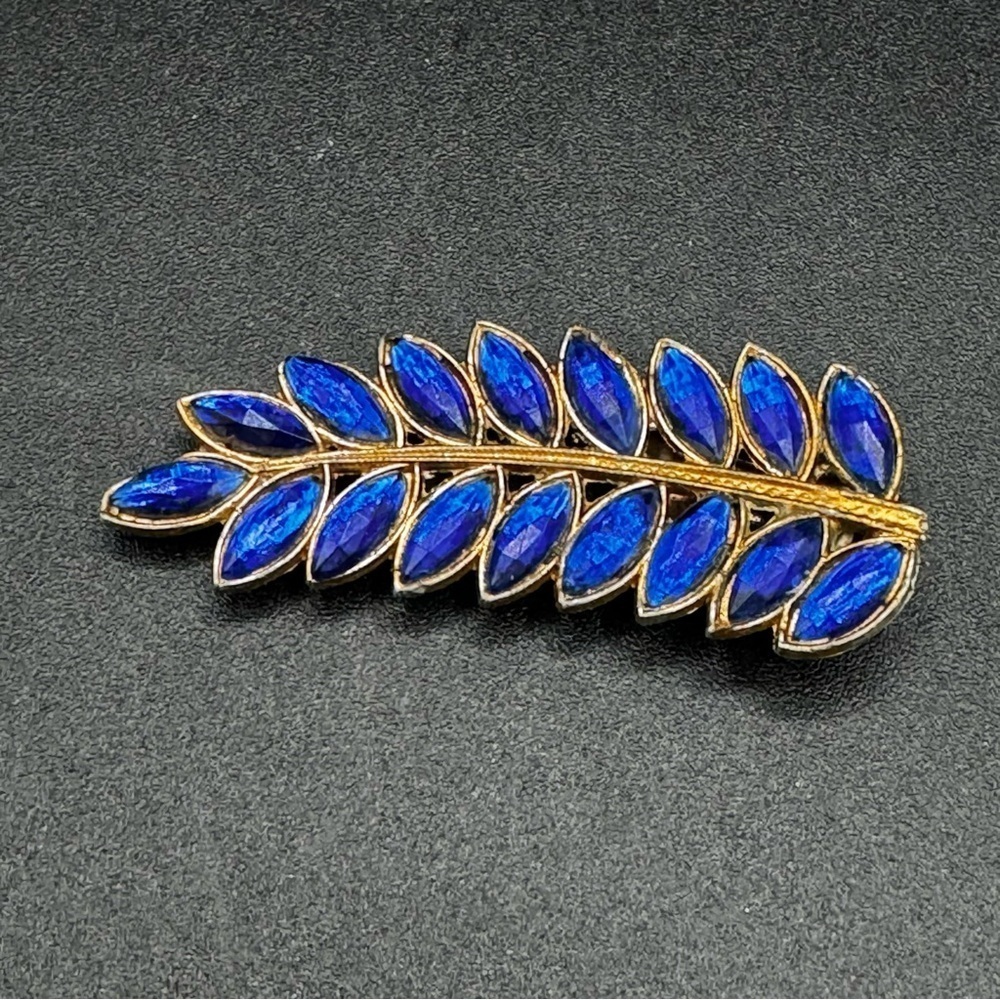 Vintage Signed Sapphire Blue Rhinestone and Gold Tone Leaf Dress Clip